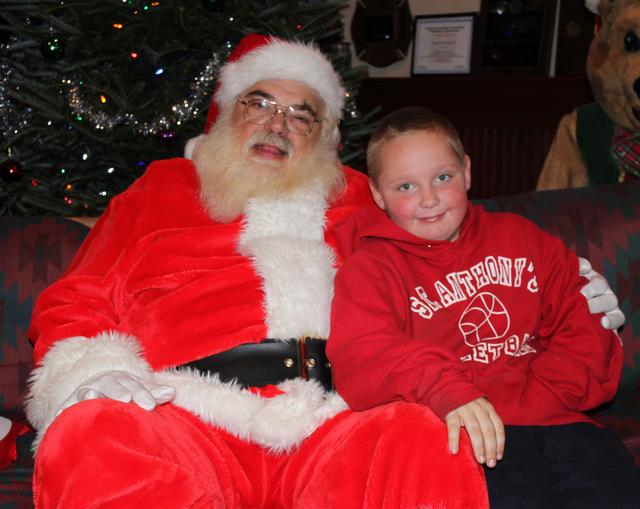 Children's Christmas Party at 8-100. 12-9-2012. Santa pays a visit . Photo by Vincent P. Tuzzolino